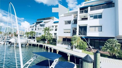 Fantastic intracoastal waterfront townhome with rare