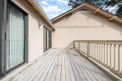 Welcome to this charming two-bedroom, two-bathroom end-unit - photo 26