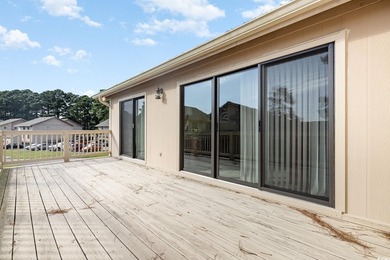 Welcome to this charming two-bedroom, two-bathroom end-unit - photo 27