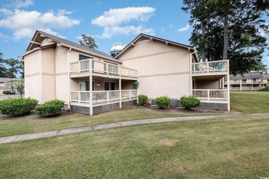 Welcome to this charming two-bedroom, two-bathroom end-unit - photo 32