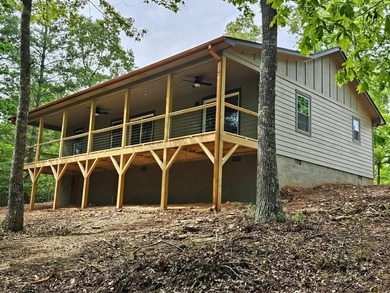 JUST REDUCED! Welcome home to this Brand-New 2BR/2BA Cabin