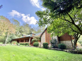 AUCTION: Waterfront Log Home on 14+/- Acres with Private Dock.
- Lake Auction SOLD! in Cadiz, Kentucky