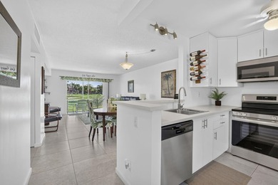 Beautifully updated 2-bedroom, 2-bath first-floor corner unit in - photo 1