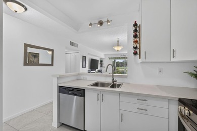 Beautifully updated 2-bedroom, 2-bath first-floor corner unit in - photo 4