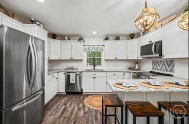 Lake Sinclair living at its best. This fully renovated 3 bedroom - photo 3