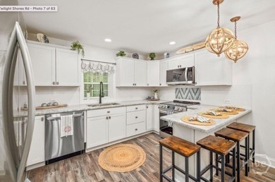 Lake Sinclair living at its best. This fully renovated 3 bedroom - photo 4