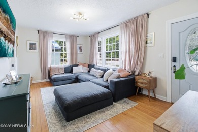 *Charming brick home with timeless curb appeal under a canopy of - photo 3