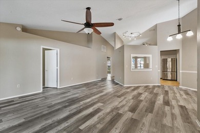 BEAUTIFULLY UPDATED 4 BR/2 BA LAKEFRONT HOME in DESIRABLE - photo 11