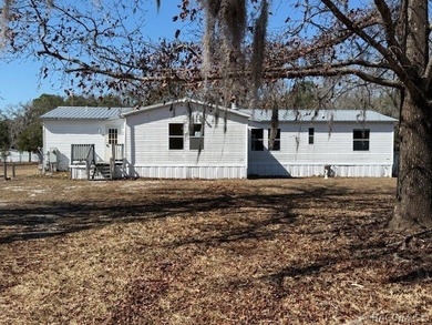 Discover the potential of this 4 bedroom, 2 bathroom - photo 1