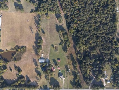 Approximately six acres of beautifully cleared land featuring a - photo 16