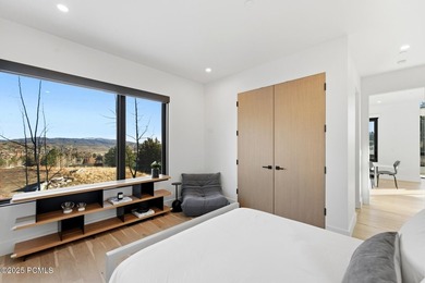 This six-bedroom residence features an open, thoughtfully - photo 13
