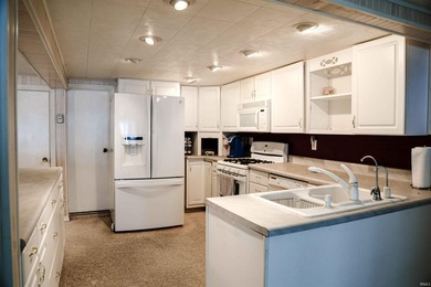 Experience stunning views of Lake Bruce from both the main level - photo 26