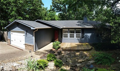 Nestled among the trees and backing directly to the Lago Vista - photo 1