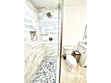 This substantially remodeled corner lot home in the serene - photo 11