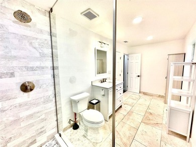 This substantially remodeled corner lot home in the serene - photo 12