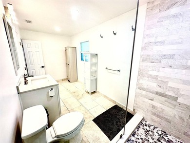 This substantially remodeled corner lot home in the serene - photo 13
