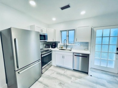 This substantially remodeled corner lot home in the serene - photo 20