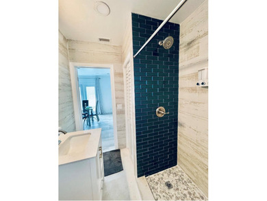 This substantially remodeled corner lot home in the serene - photo 27