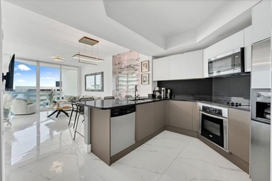 This 1-bedroom, 1.5-bath residence at Platinum Condominium