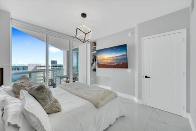 This 1-bedroom, 1.5-bath residence at Platinum Condominium