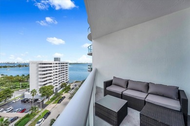 This 1-bedroom, 1.5-bath residence at Platinum Condominium
