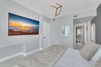 This 1-bedroom, 1.5-bath residence at Platinum Condominium