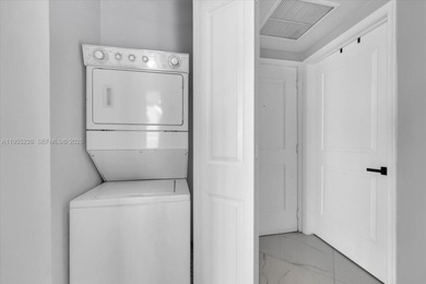 This 1-bedroom, 1.5-bath residence at Platinum Condominium