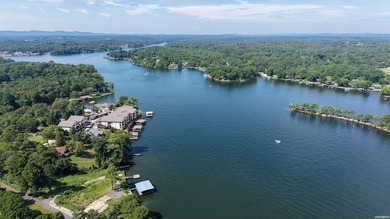 Catch a glimpse of Lake Hamilton from this charming upstairs - photo 10