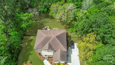 Welcome to this 5-bedroom, 4-bath home that sits on a 1.49-acre - photo 3