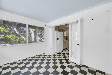 PRICE REDUCED !!Upon entering the gates of Four Mile Village you - photo 19