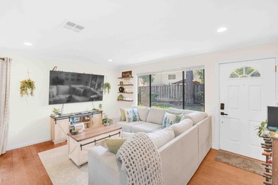 The Best Location in the Community! Light & Bright End Unit with - photo 4