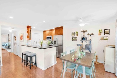The Best Location in the Community! Light & Bright End Unit with - photo 6