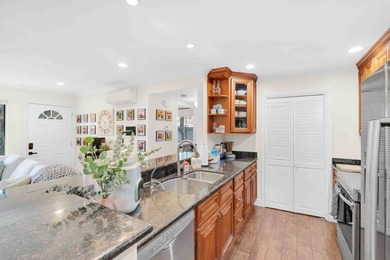 The Best Location in the Community! Light & Bright End Unit with - photo 8