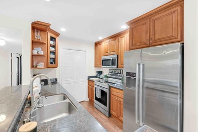 The Best Location in the Community! Light & Bright End Unit with - photo 9