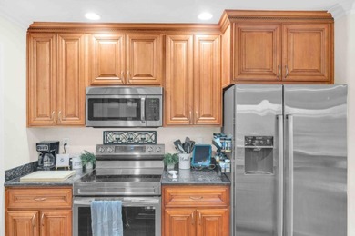 The Best Location in the Community! Light & Bright End Unit with - photo 10