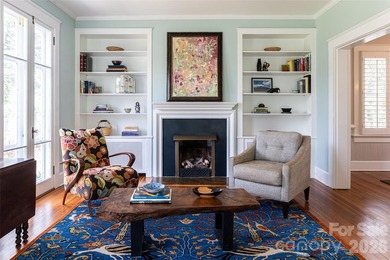 There is a warm, inviting grace to this Grove Park home that - photo 3