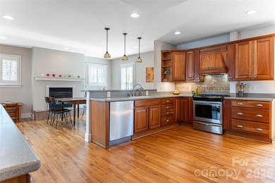 There is a warm, inviting grace to this Grove Park home that - photo 7