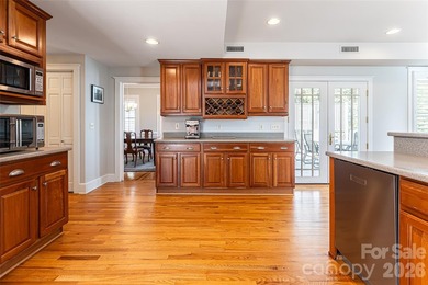 There is a warm, inviting grace to this Grove Park home that - photo 9