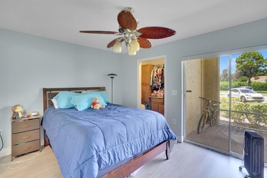 Welcome to this inviting first-floor condo in a gated community - photo 12