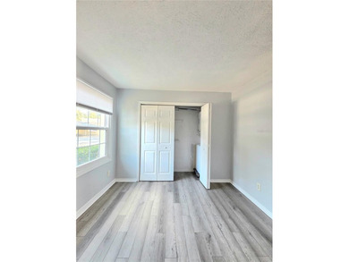 This waterfront ground-level 2-bedroom, 1-bath charmer comes - photo 13