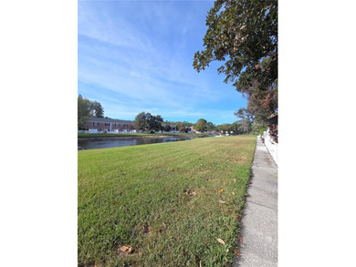 This waterfront ground-level 2-bedroom, 1-bath charmer comes - photo 16