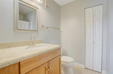 Welcome to this inviting first-floor condo in a gated community - photo 17