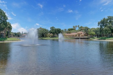 Welcome to this inviting first-floor condo in a gated community - photo 21