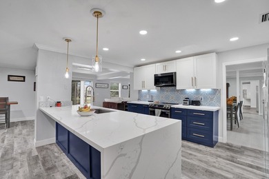 Don't miss this spacious turn key updated 5-bedroom, 3-bath - photo 4