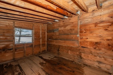 Tucked away on coveted Sebec Lake, this rustic camp feels like - photo 25