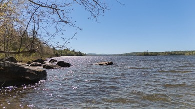 Tucked away on coveted Sebec Lake, this rustic camp feels like - photo 31
