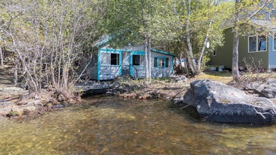 Tucked away on coveted Sebec Lake, this rustic camp feels like - photo 35