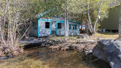 Tucked away on coveted Sebec Lake, this rustic camp feels like - photo 36