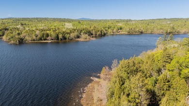 Tucked away on coveted Sebec Lake, this rustic camp feels like - photo 42