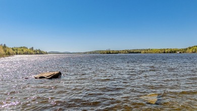 Tucked away on coveted Sebec Lake, this rustic camp feels like - photo 45
